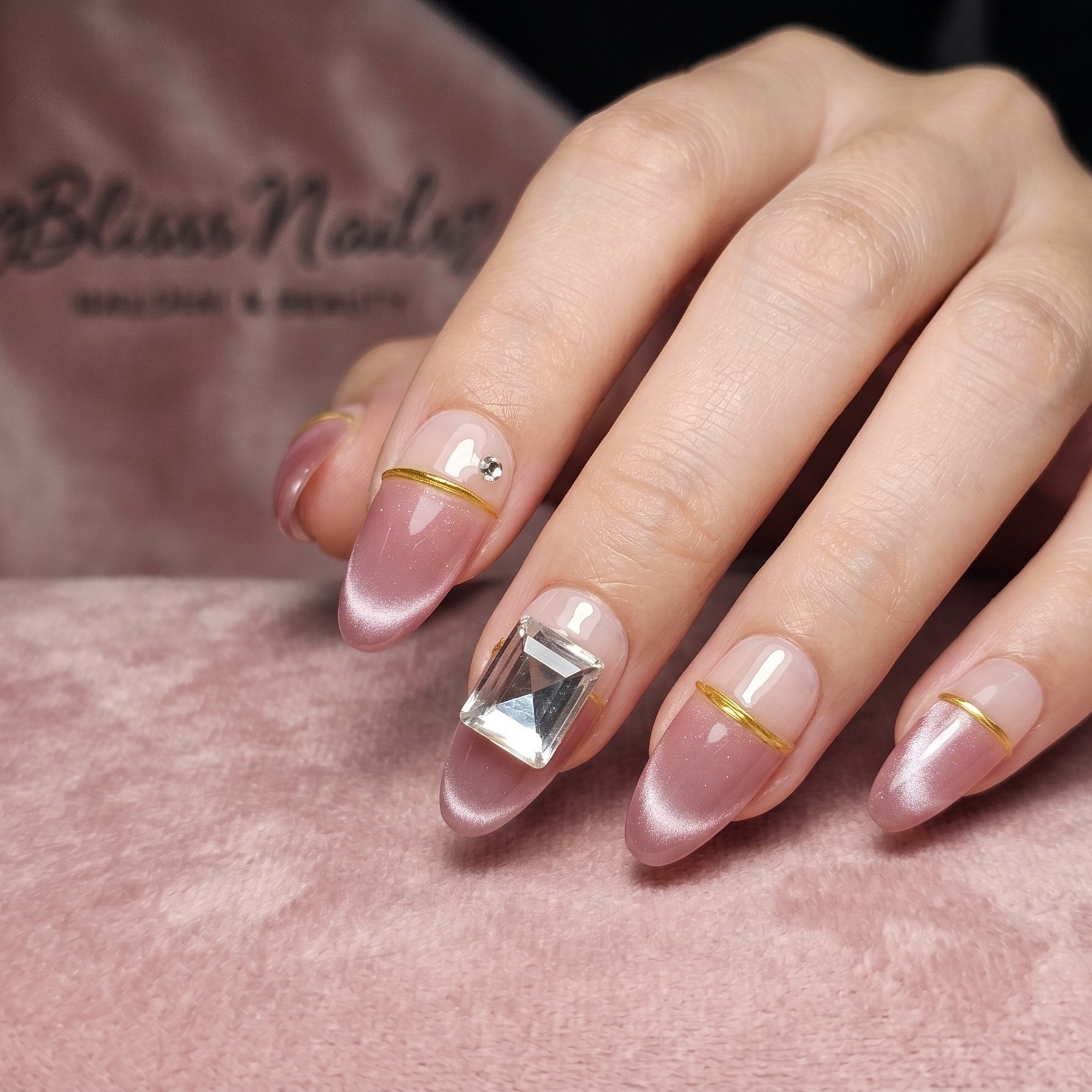 Blisss Nails Premium Handmade Pink French Tip with cat Eye Effect Fake Nails – Short Almond Artificial Reusable Press On Nails with Gold Line Detail & Crystal Accent | Elegant Salon Finish  10 pc Nail Set