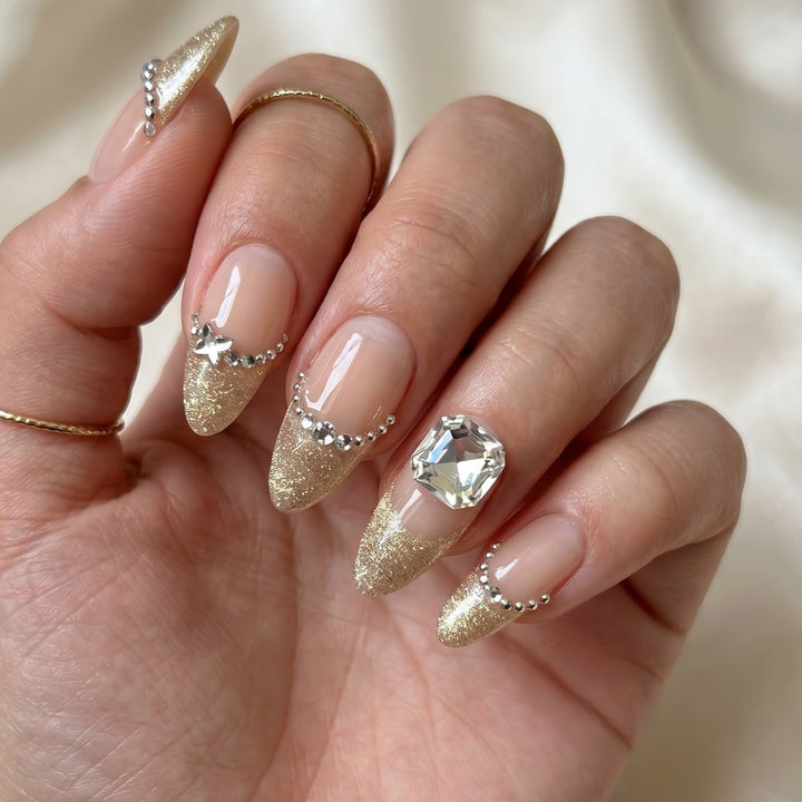 Blisss Nails Premium Handmade Nude Pink with Cat Eye Effect Gold French Fake Nails – Medium Almond Artificial Reusable Press On Nails with Crystal Rhinestones & Champagne Glitter Tips | Luxury Salon Finish 10 pc Nail Set